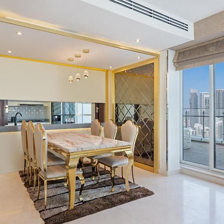 Damac Maison Distinction Dubai Exterior photo A dining room in a luxury apartment