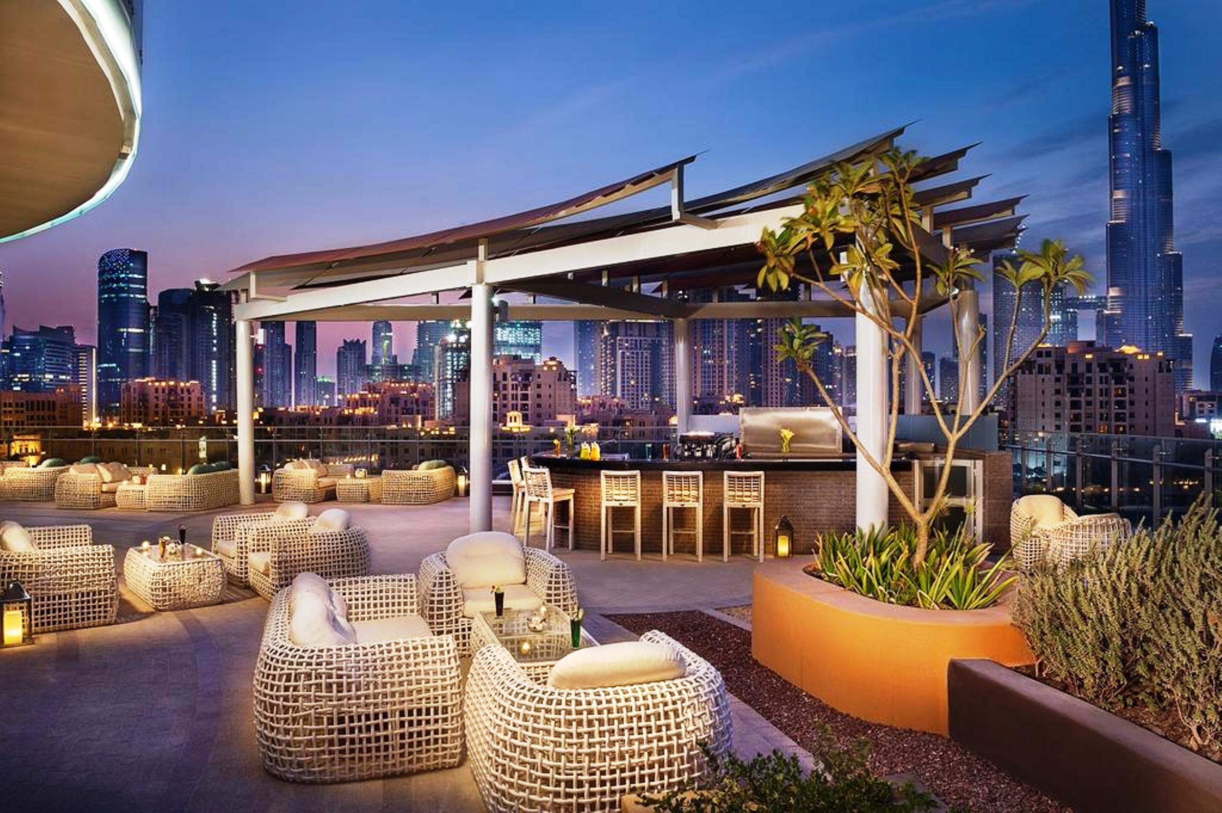 Damac Maison Distinction Dubai Exterior photo The rooftop bar at the hotel