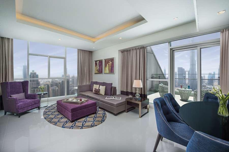 Damac Maison Distinction Dubai Room photo A living room in a typical apartment