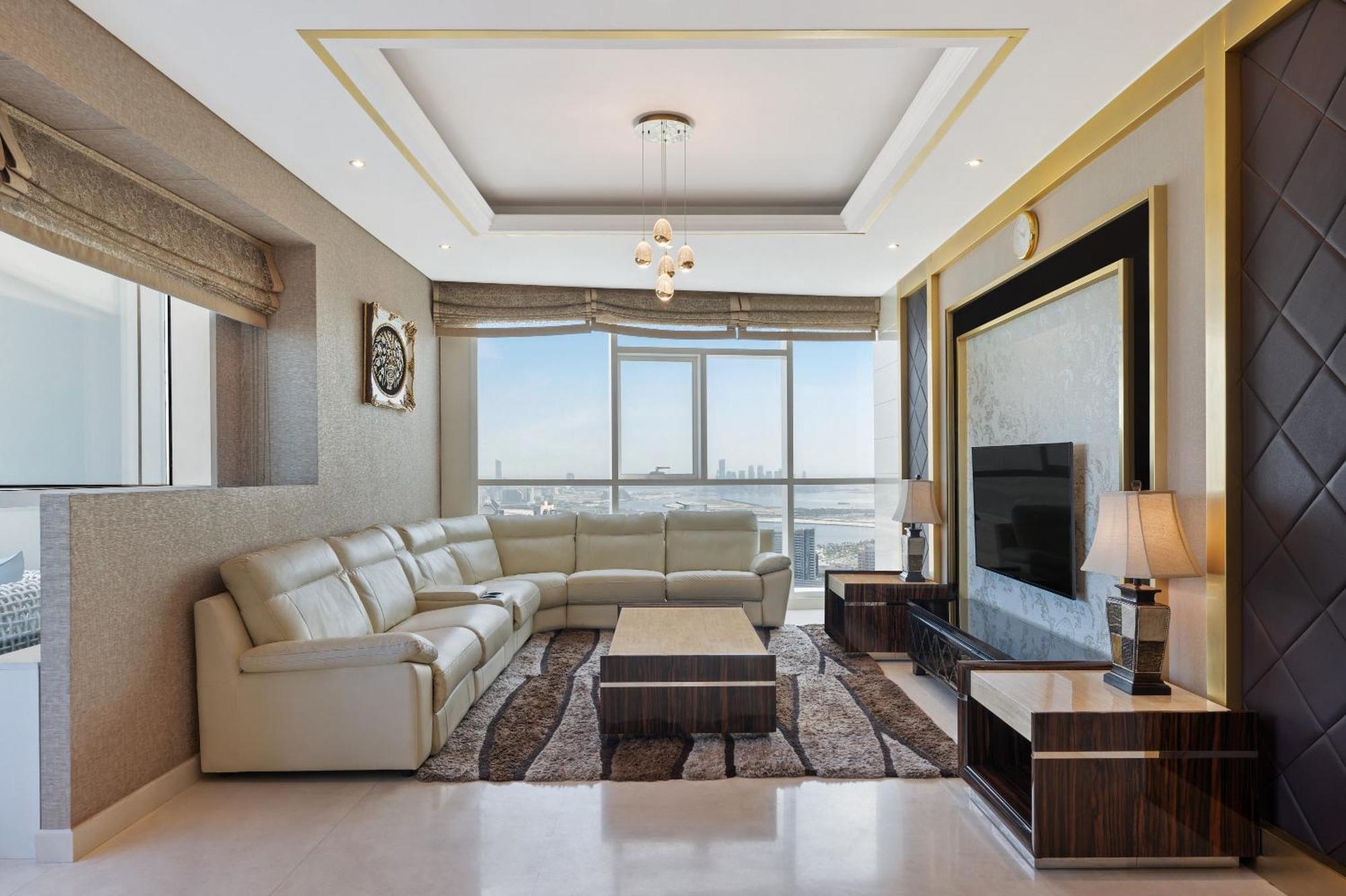 Damac Maison Distinction Dubai Exterior photo A living room in a typical apartment