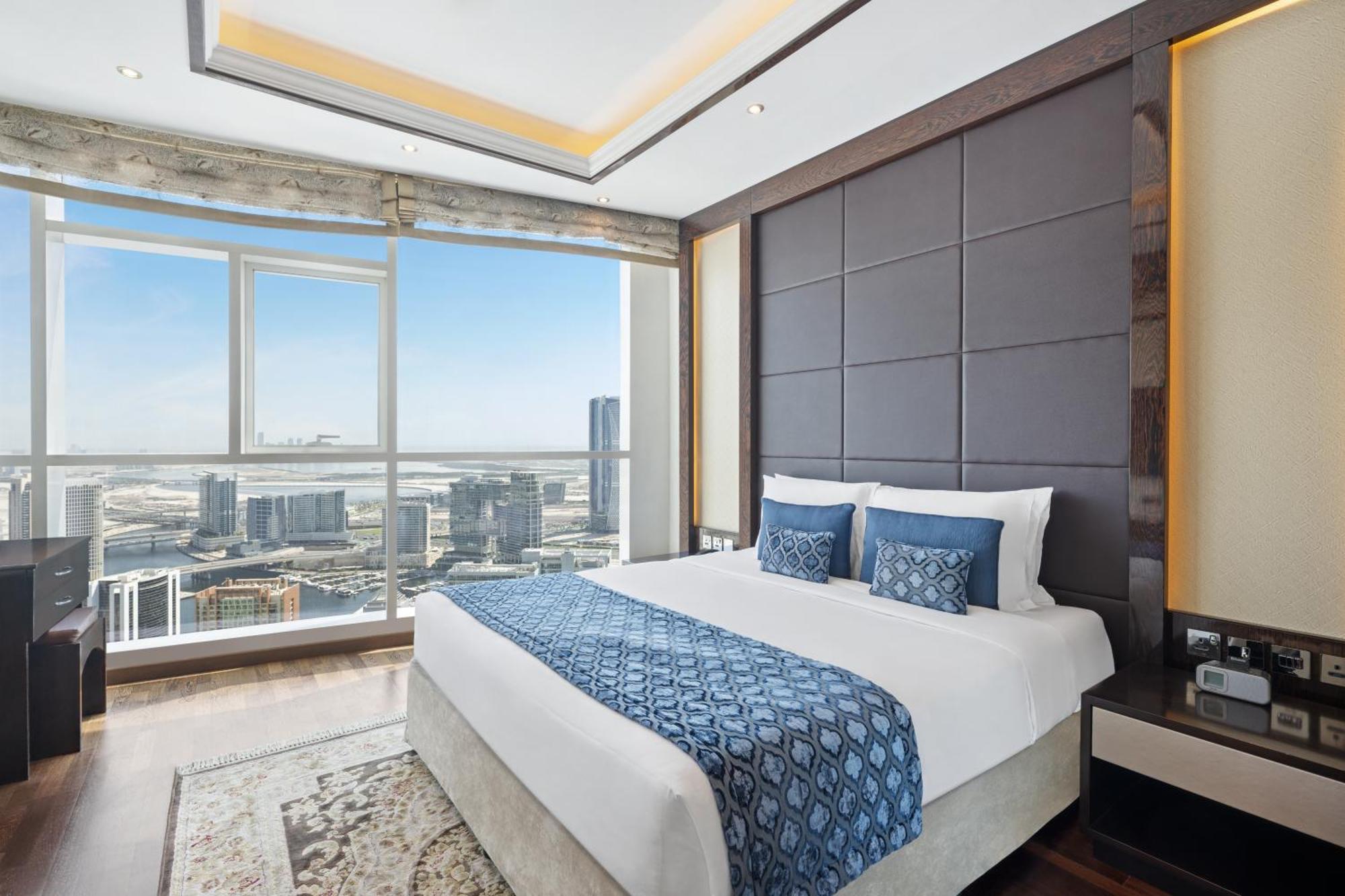 Damac Maison Distinction Dubai Exterior photo A bedroom at the hotel