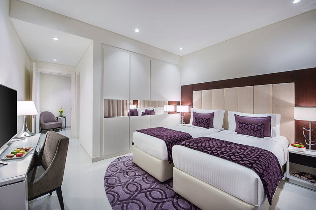 Damac Maison Distinction Dubai Exterior photo A bedroom at the hotel